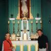 Carlo and Cristina standing at the alter made by Carlo's ancestor, Fr. Ravalli.