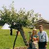 Carlo and Cristina posing beside the apple tree planted by Fr. Ravalli in the mid-1800s.